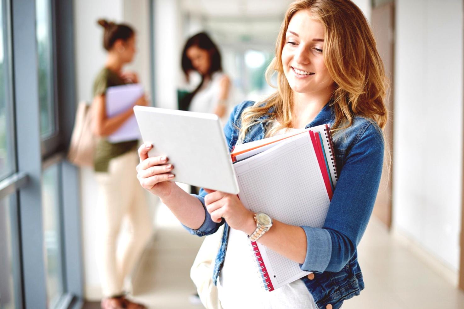 Students collaborating on cash flow analysis exercises during hands-on workshop session